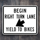 Begin right turn lane yield to bikes United States Road Sign Sticker